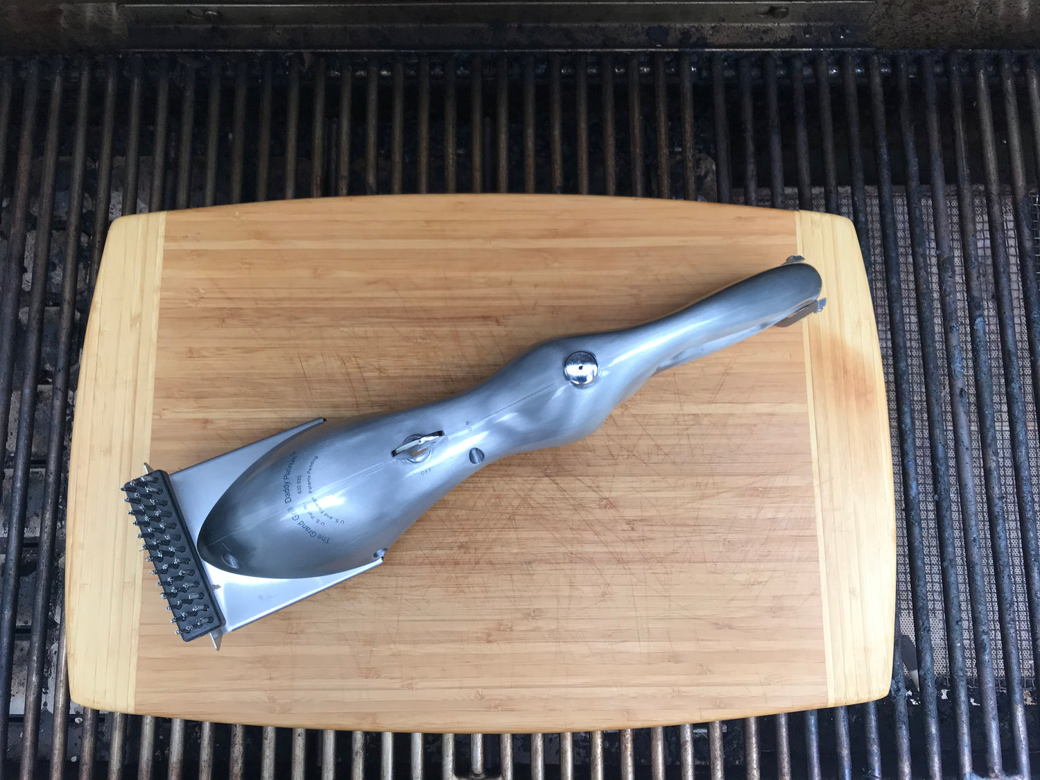The Grill Daddy cleaning brush uses steam to melt away stuck-on food